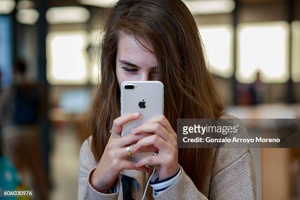 Customer takes a selfie with a new Iphone 7 exhibited at Puerta del Sol Apple Store the day the company launches their Iphone 7 and 7 Plus on...