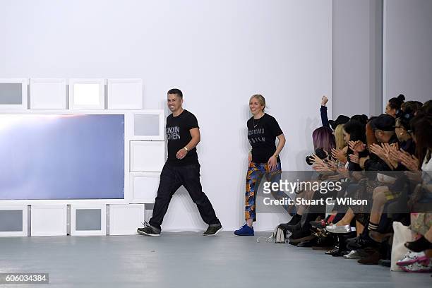 Designers Rob Jones and Catherine Teatum appear on the runway at the Teatum Jones show during London Fashion Week Spring/Summer collections 2017 on...