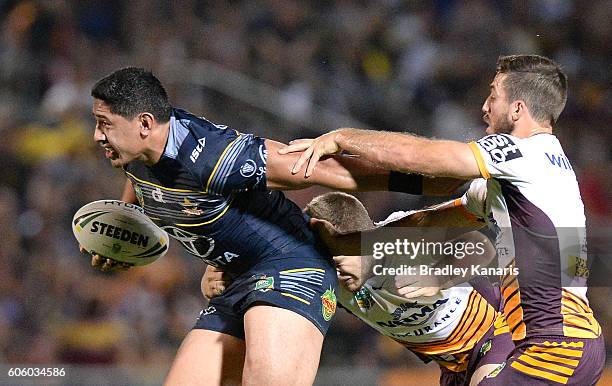 Jason Taumalolo of the Cowboys attempts to break away from the defence during the first NRL semi final between North Queensland Cowboys and Brisbane...