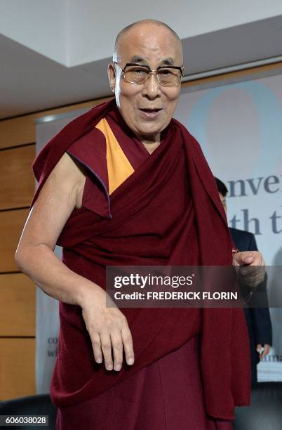 The Dalai Lama arrives to take part in a dialogue with scientists at the University of Strasbourg, eastern France, on September 16, 2016. The Dalai...