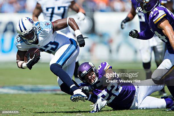 Harry Douglas of the Tennessee Titans runs the ball and is grabbed by Harrison Smith of the Minnesota Vikings at Nissan Stadium on September 11, 2016...