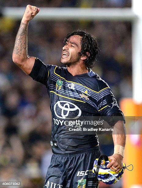 Johnathan Thurston of the Cowboys celebrates victory after the first NRL semi final between North Queensland Cowboys and Brisbane Brisbane at...