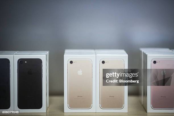 Boxes of iPhone 7 smartphones are displayed at an Apple Inc. In New York, U.S., on Friday, Sept. 16, 2016. Shoppers looking to buy Apple Inc.'s new...