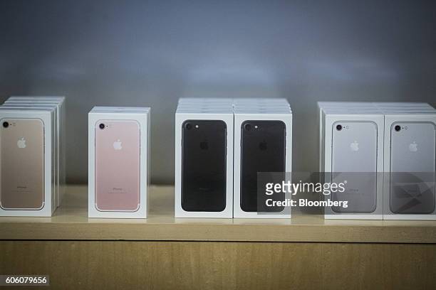 Boxes of iPhone 7 smartphones are displayed at an Apple Inc. In New York, U.S., on Friday, Sept. 16, 2016. Shoppers looking to buy Apple Inc.'s new...