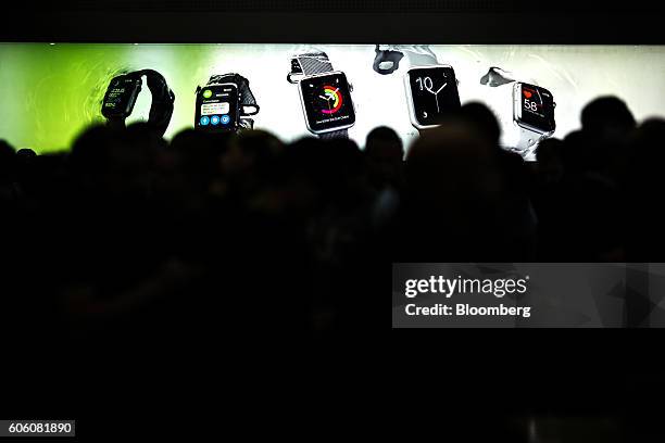 Customers wait in line for an iPhone 7 smartphone at an Apple Inc. In New York, U.S., on Friday, Sept. 16, 2016. Shoppers looking to buy Apple Inc.'s...