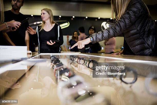 Customer views the Apple Watch Series 2 is displayed at an Apple Inc. In New York, U.S., on Friday, Sept. 16, 2016. Shoppers looking to buy Apple...