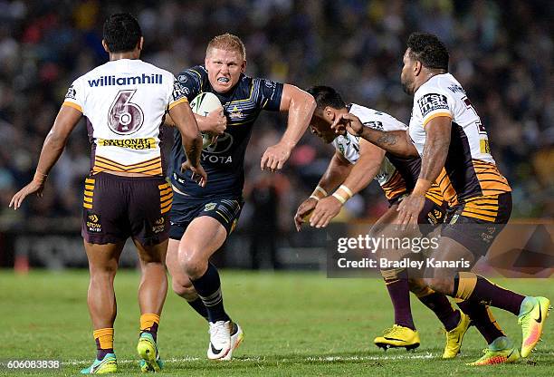 Ben Hannant of the Cowboys takes on the defence during the first NRL semi final between North Queensland Cowboys and Brisbane Brisbane at 1300SMILES...