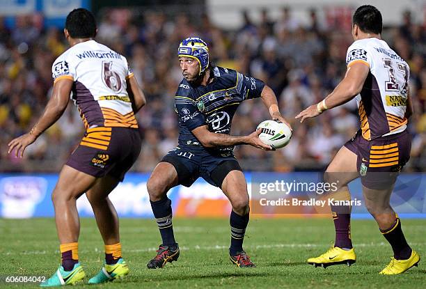 Johnathan Thurston of the Cowboys looks to pass during the first NRL semi final between North Queensland Cowboys and Brisbane Brisbane at 1300SMILES...