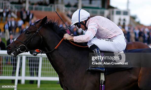 Jimmy Fortune riding Temple Church win The Haynes, Hanson & Clark Conditions Stakes at Newbury Racecourse on September 16, 2016 in Newbury, England.