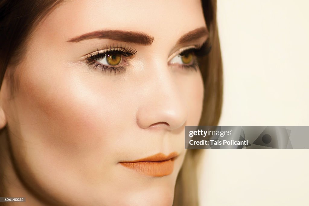 Beautiful blonde woman smiling - perfect make up