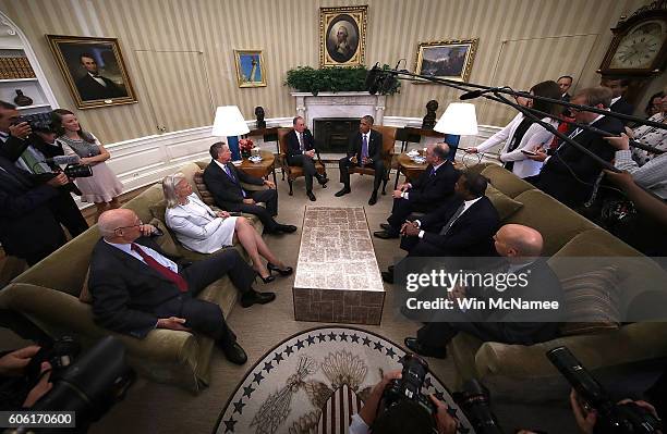 President Barack Obama meets with business, government, and national security leaders in the Oval Office of the White House September 16, 2016 in...