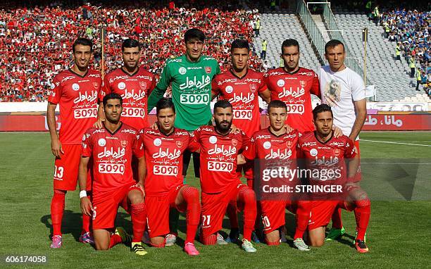 Persepolis's starting eleven pose for a group picture ahead of their Persian Gulf Pro League derby football match between Persepolis FC and Esteghlal...
