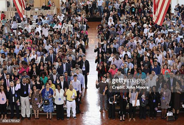 Immigrants take the oath of citizenship to the United States in the Great Hall of Ellis Island on September 16, 2016 in New York City. The ceremony...