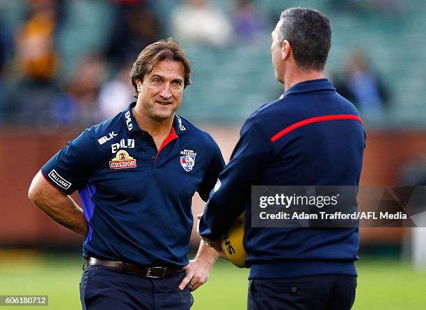 Luke Beveridge, Senior Coach of the Bulldogs chats to Rohan Smith, Assistant Coach of the Bulldogs during the 2016 AFL Second Semi Final match...