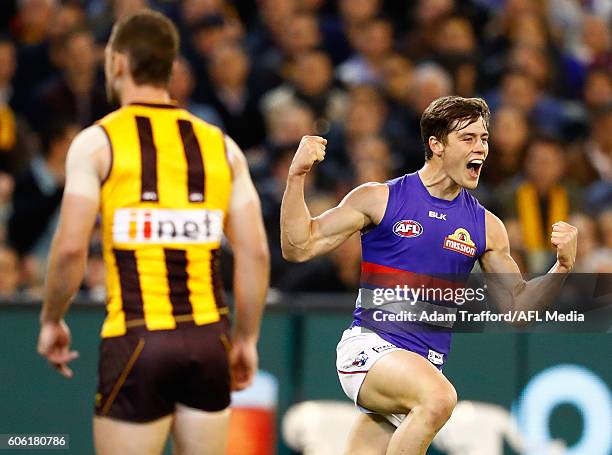 Josh Dunkley of the Bulldogs celebrates a goal during the 2016 AFL Second Semi Final match between the Hawthorn Hawks and the Western Bulldogs at the...