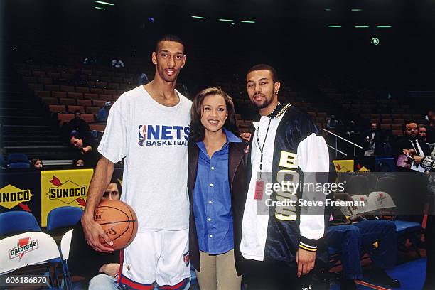 Kery Kittles of the New Jersey Nets poses for a photo with actress, Vanessa Williams before the game against the Atlanta Hawks at the Continental...