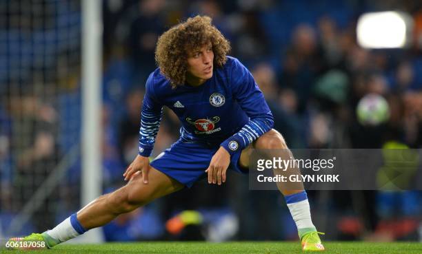 Chelsea's Brazilian defender David Luiz warms up ahead of the English Premier League football match between Chelsea and Liverpool at Stamford Bridge...