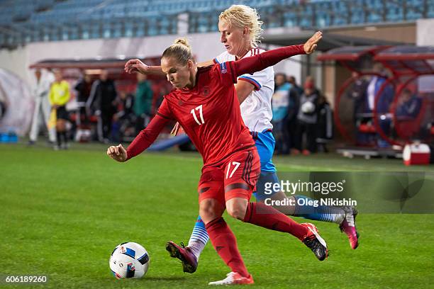 Elena Morozova of Russia challenged by Isabel Kerschowski of Germany during the UEFA Women's Euro 2017 Qualifier between Russia and Germany at Arena...
