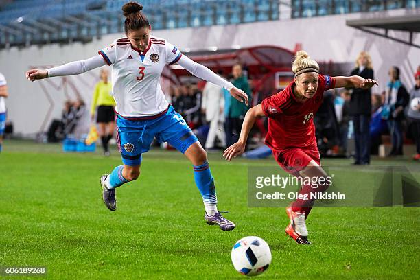 Anna Kozhnikova of Russia challenged by Svenja Huth of Germany during the UEFA Women's Euro 2017 Qualifier between Russia and Germany at Arena Khimki...