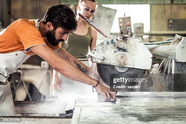 stonecutter at work - grinding stock pictures, royalty-free photos & images