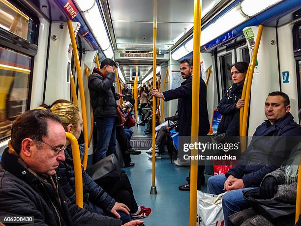 people traveling in madrid metro, spain - madrid metro stock pictures, royalty-free photos & images