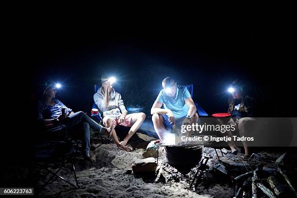 family bbq on the beach - australian bbq stock pictures, royalty-free photos & images