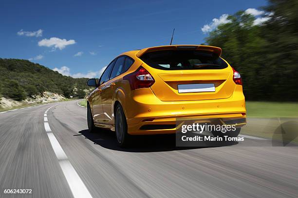fast car driving - parachoques fotografías e imágenes de stock