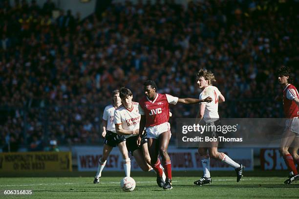 English footballer David Rocastle on the ball for Arsenal during the Football League Cup final against Liverpool at Wembley Stadium, London, 5th...