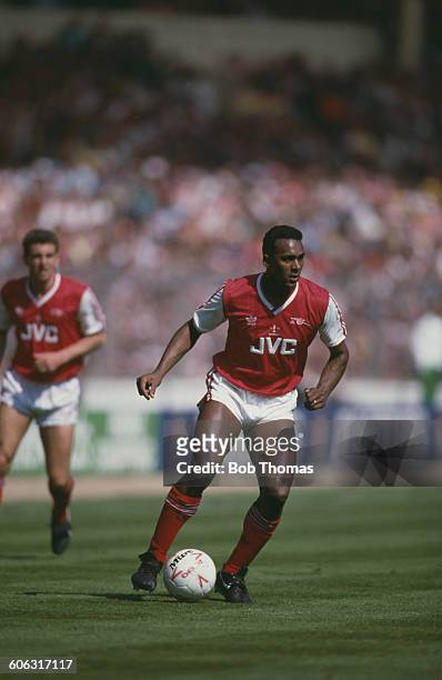 English footballer David Rocastle on the ball for Arsenal during the Football League Cup final against Liverpool at Wembley Stadium, London, 5th...