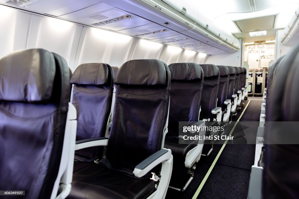 Empty chairs in airplane