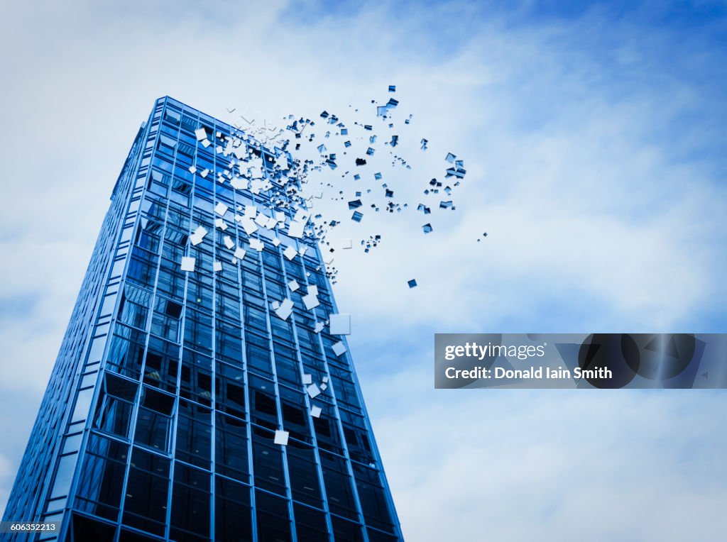 Pixelated highrise building and cloudy sky