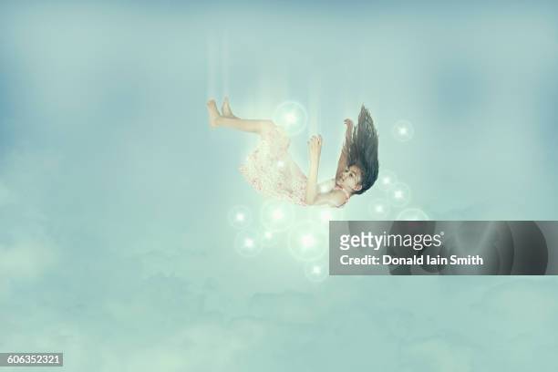 mixed race girl falling in sky - 12 13 years stock illustrations