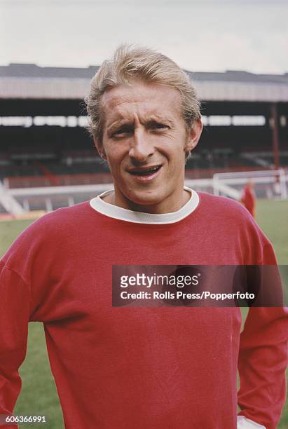Scottish footballer and forward with Manchester United Football Club, Denis Law pictured on the pitch at United's Old Trafford stadium in Manchester,...