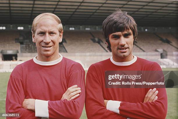 English footballer and midfielder with Manchester United Football Club, Bobby Charlton posed on left with Northern Irish winger George Best on the...