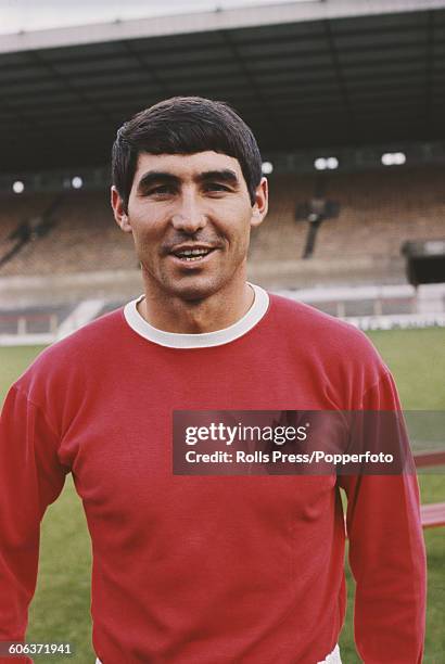 Irish footballer and left-back with Manchester United Football Club, Tony Dunne posed on the pitch at United's Old Trafford stadium in Manchester,...