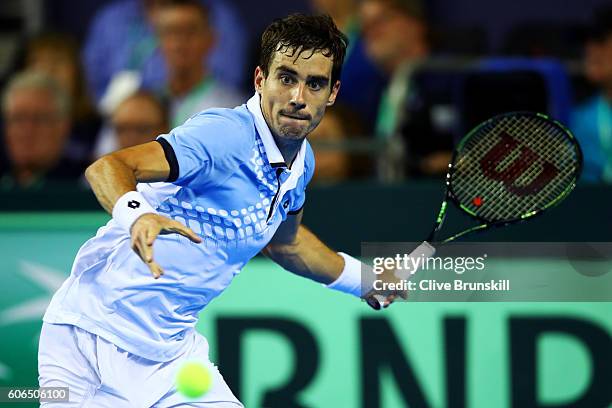 Guido Pella of Argentina hits a forehand during his singles match against Kyle Edmund of Great Britain during day one of the Davis Cup Semi Final...