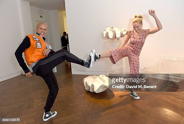 Adwoa Aboah and Clara Paget attend the Shrimps SS17 Presentation dinner featuring Converse at Christie's on September 16, 2016 in London, England.