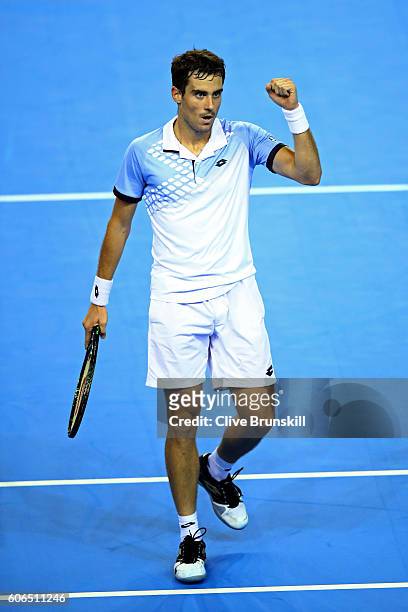 Guido Pella of Argentina celebrates a point during his singles match against Kyle Edmund of Great Britain during day one of the Davis Cup Semi Final...
