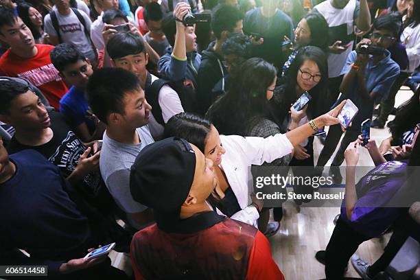 Andre De Grasse poses for selfies. Olympic triple sprint medalist, Andre De Grasse returns his alma mater, Milliken Mills High School, to join...