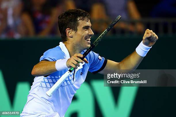 Guido Pella of Argentina celebrates victory in his singles match against Kyle Edmund of Great Britain during day one of the Davis Cup Semi Final...