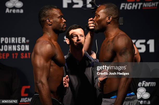 Uriah Hall of Jamaica and Derek Brunson of the United States face off during the UFC Fight Night weigh-in at the State Farm Arena on September 16,...