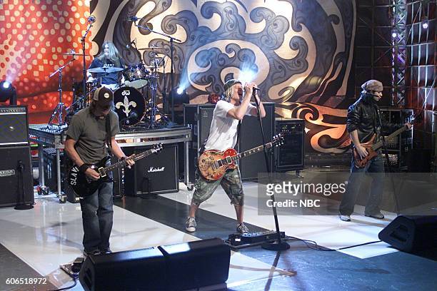 Episode 2631 -- Pictured: Musical guests Paul Phillips, Greg Upchurch, Wes Scantlin, Doug Ardito of Puddle of Mudd perform on January 16, 2004 --