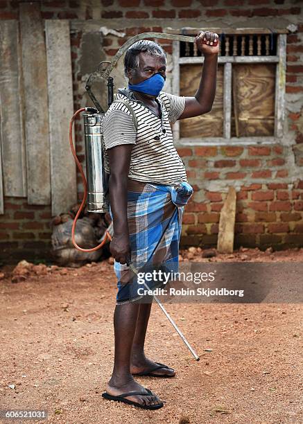 portrait of man with spraying machine - tee srilanka stock pictures, royalty-free photos & images