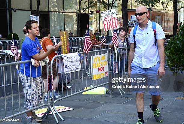 August 27, 2016: U.S. Presidental candidate Bernie Sanders supporters opposed to Hillary Clinton's nomination demonstrate outside NBC News...