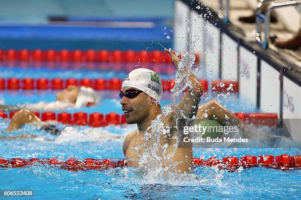 Daniel Dias of Brazil celebrates winning the gold medal in the Men's 50m Backstroke - S5 Final on day 9 of the Rio 2016 Paralympic Games at the...