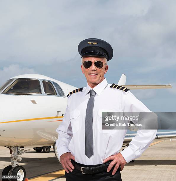 executive jet pilot - aviator glasses stock-fotos und bilder