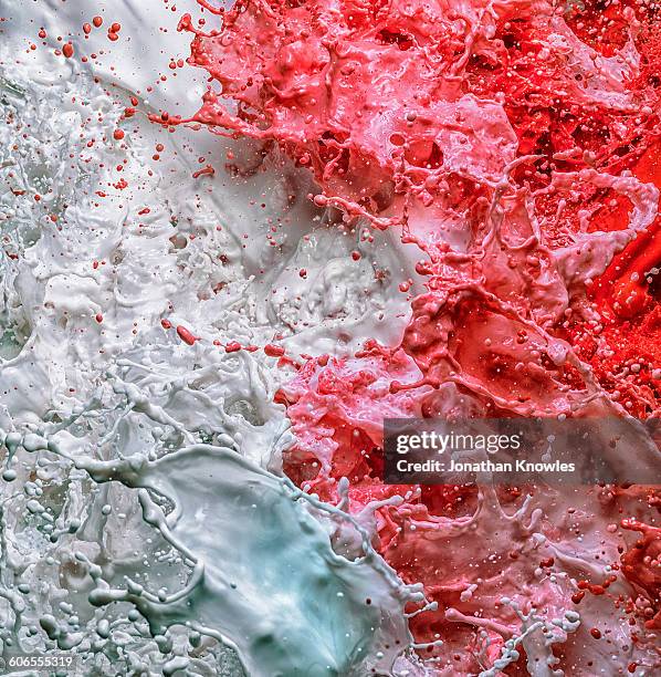 turbulent liquid, shades of white, red and blue - zusammenschluss stock-fotos und bilder