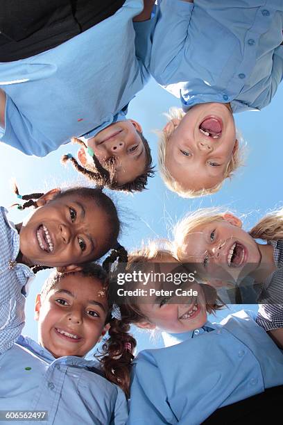 school children looking down - 6 year old blonde girl stock pictures, royalty-free photos & images