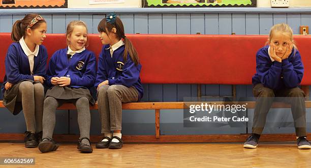 school girls on bench, one excluded - endast flickor bildbanksfoton och bilder