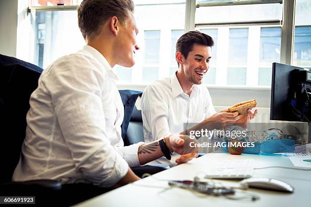 two young business men on their lunch break - medhavd lunch bildbanksfoton och bilder